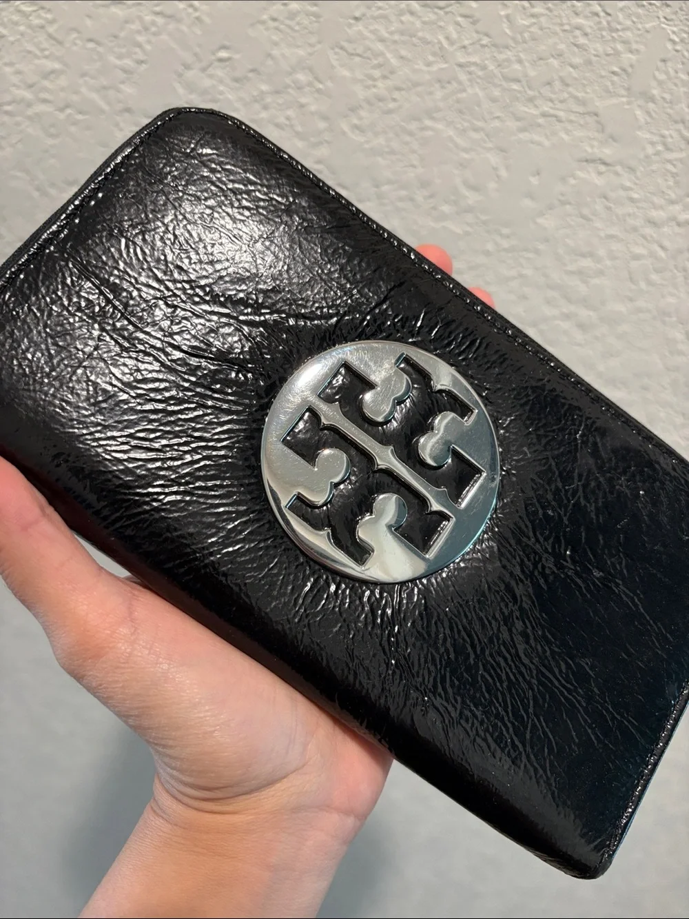 Tory Burch Black Patent Leather Zip-Around Wallet with Silver Logo Medallion